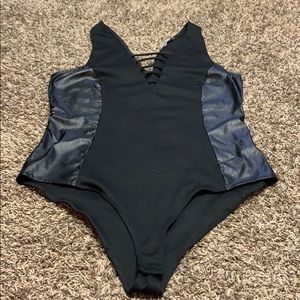 Bodysuit with leather sides